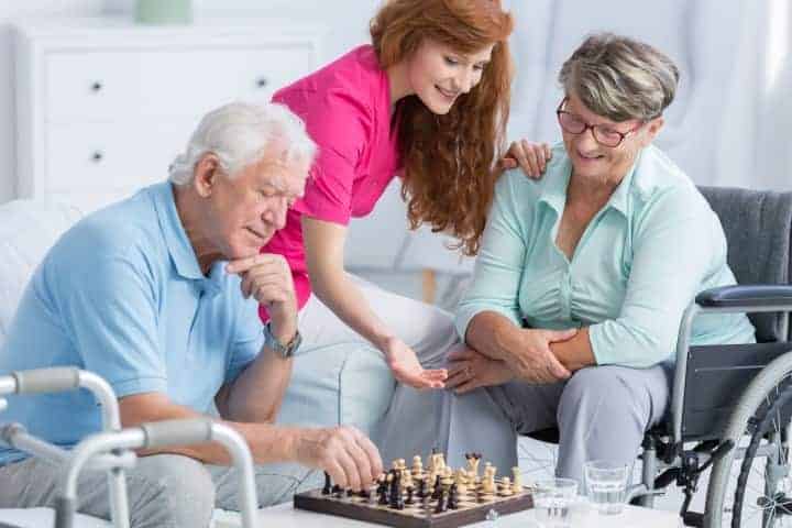 elderly couple with live-in carer