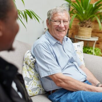senior man laughing with a friend