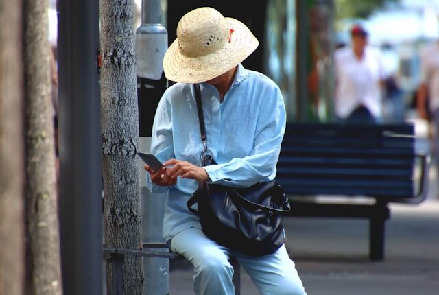 woman face-timing her elderly mother